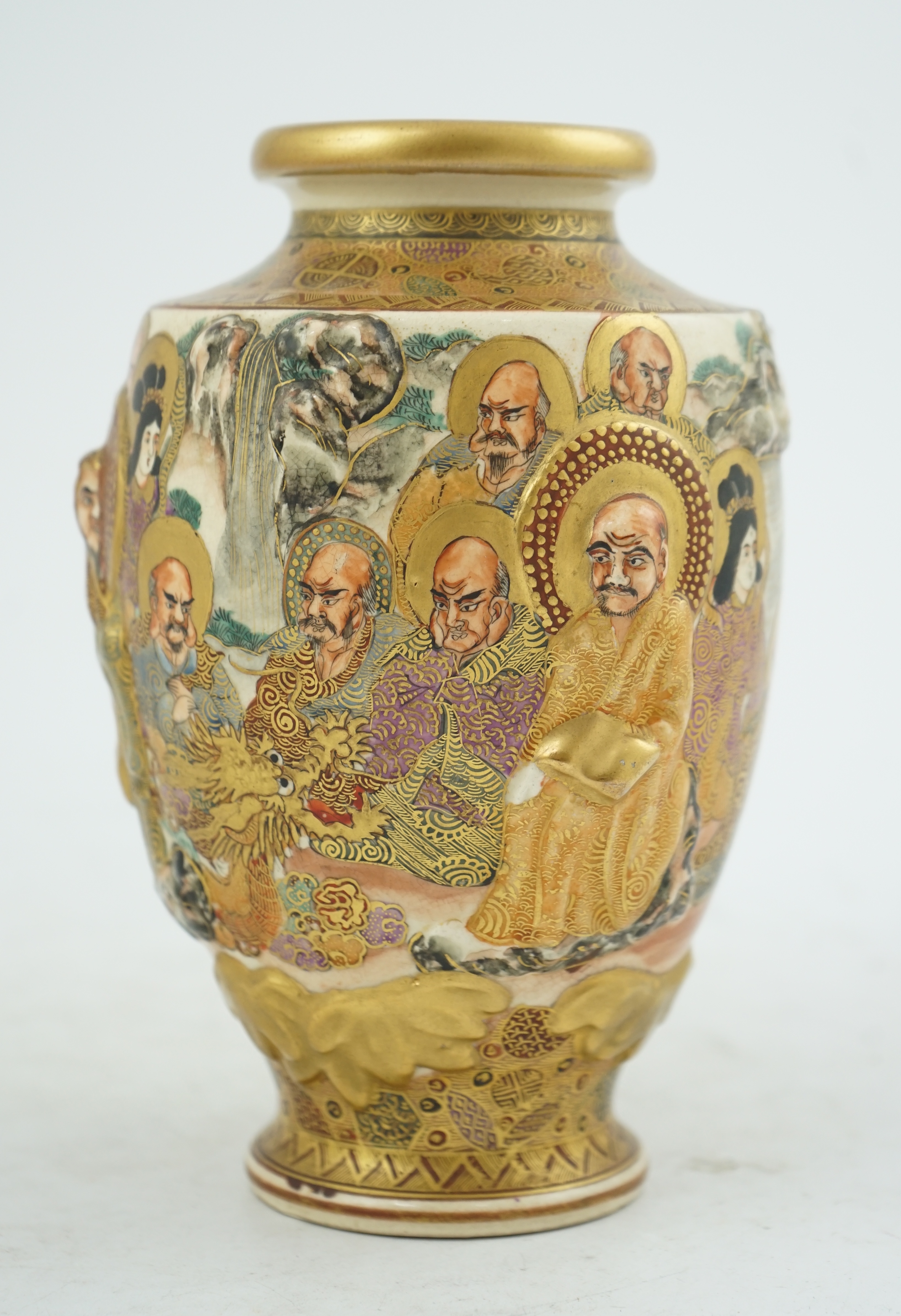 A Japanese Satsuma relief moulded ‘rakan’ vase, Meiji period